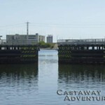 Boat lock at Port Canaveral at Cast Away Adventures, Florida, featuring waterway access for cruise and boat excursions. Perfect for adventure seekers and marine exploration.
