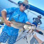 Nice Snook! fishing adventure on a boat at CastawayFL.com, featuring scenic waters and outdoor fun in Florida. Enjoy memorable fishing experiences with friends and family.